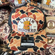 TRUCKER HAT: ORANGE CAMO “Ritz” Patch